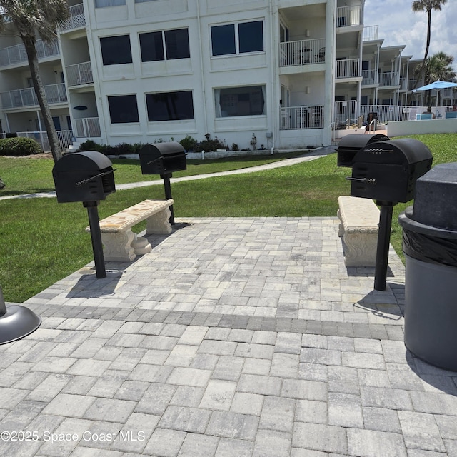 935 S Atlantic Ave Unit 234, Daytona Beach, FL 32118 - surrounding community featuring a lawn