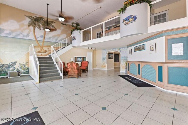 935 S Atlantic Ave Unit 234, Daytona Beach, FL 32118 - community lobby with stairs and a towering ceiling