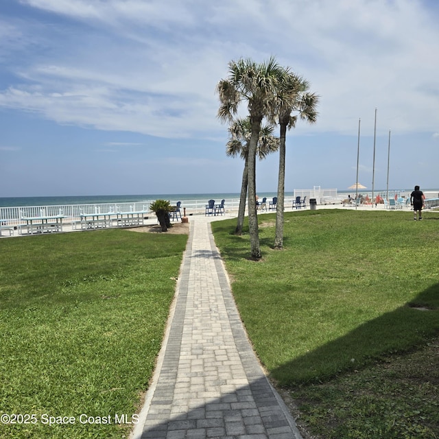 935 S Atlantic Ave Unit 234, Daytona Beach, FL 32118 - surrounding community featuring a yard and a water view