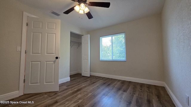1880 Murrell Rd Unit E19, Rockledge, FL 32955 - unfurnished bedroom featuring wood finished floors, a closet, baseboards, and ceiling fan