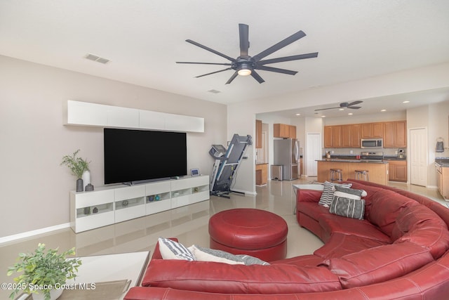 2039 Snapdragon Dr NW, Palm Bay, FL 32907 - living room featuring a ceiling fan and recessed lighting