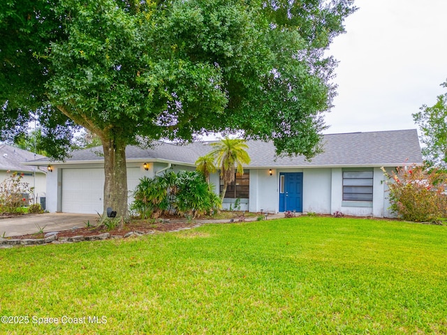 1816 Nanton St NW, Palm Bay, FL 32907 - view of front of home featuring stucco siding, concrete driveway, a garage, and a front yard