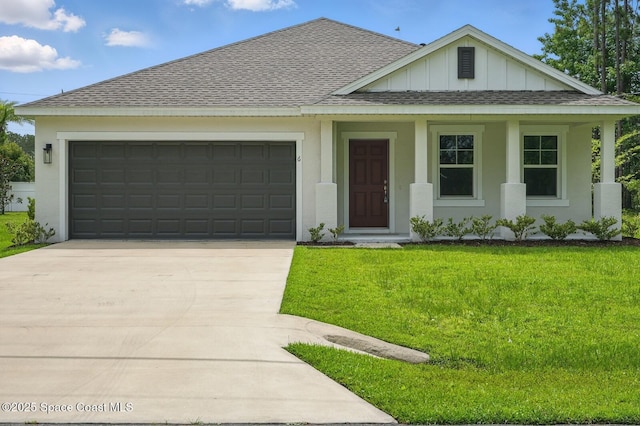 6 Potterville Ln, Palm Coast, FL 32164 - view of front of home with a shingled roof, an attached garage, board and batten siding, driveway, and a front lawn