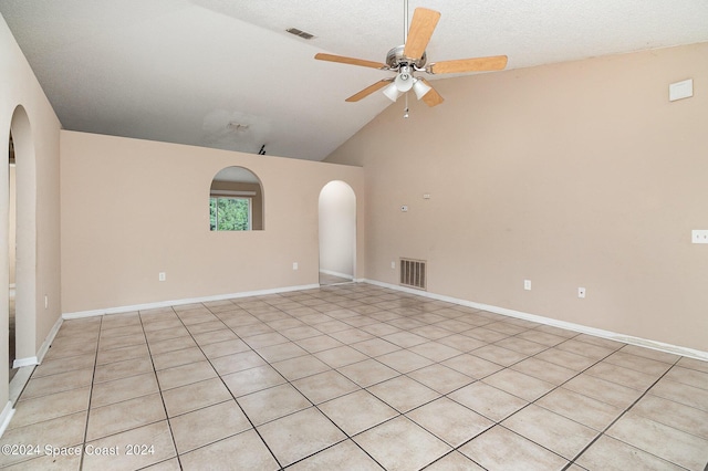 260 Hinchman St SE, Palm Bay, FL 32909 - unfurnished room featuring arched walkways, ceiling fan, high vaulted ceiling, and baseboards