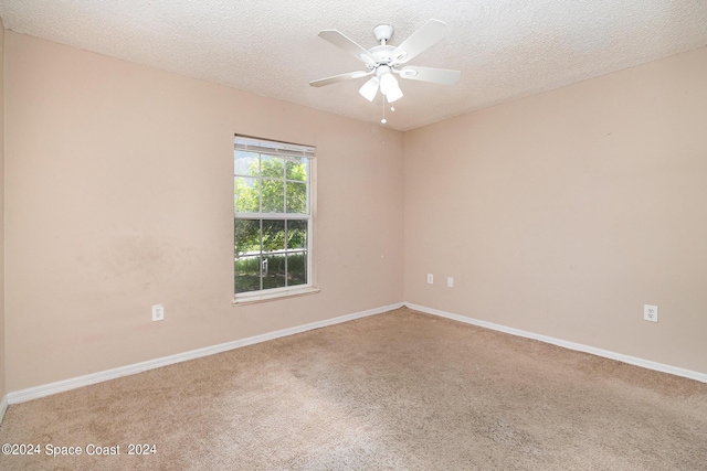 260 Hinchman St SE, Palm Bay, FL 32909 - carpeted empty room featuring a ceiling fan, baseboards, and a textured ceiling
