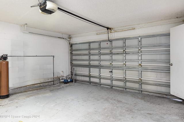 260 Hinchman St SE, Palm Bay, FL 32909 - garage with a garage door opener and concrete block wall