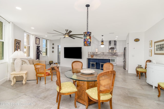333 N Atlantic Ave Unit 333, Cocoa Beach, FL 32931 - dining room featuring a ceiling fan, baseboards, and recessed lighting