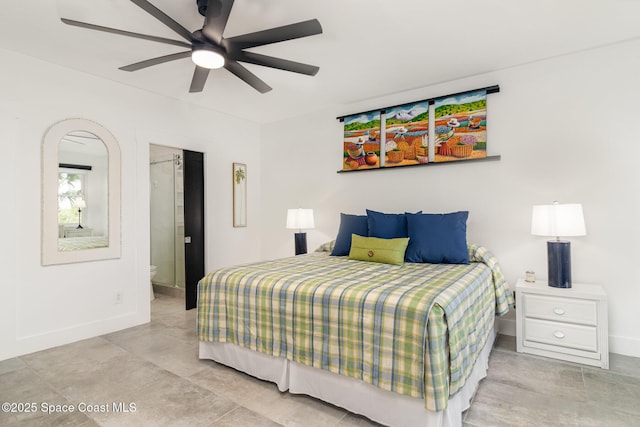 333 N Atlantic Ave Unit 333, Cocoa Beach, FL 32931 - bedroom with baseboards, a ceiling fan, and ensuite bath
