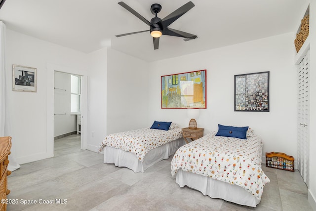 333 N Atlantic Ave Unit 333, Cocoa Beach, FL 32931 - bedroom with baseboards and ceiling fan