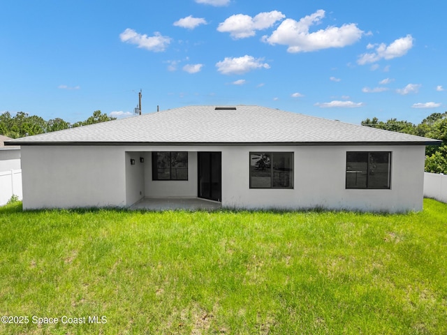 337 Fifer St SE, Palm Bay, FL 32909 - back of property with a shingled roof, stucco siding, and a patio