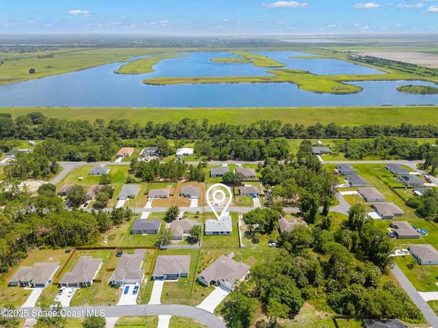 337 Fifer St SE, Palm Bay, FL 32909 - aerial overview of property's location with a nearby body of water and nearby suburban area