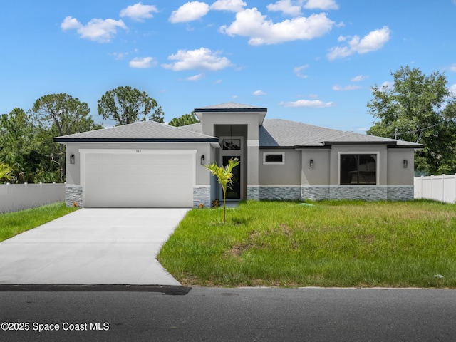 337 Fifer St SE, Palm Bay, FL 32909 - prairie-style house featuring stone siding, an attached garage, stucco siding, and concrete driveway