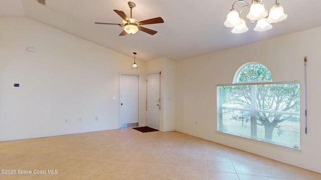 2178 Redwood Cir NE, Palm Bay, FL 32905 - unfurnished room with lofted ceiling, a chandelier, ceiling fan, and light tile patterned floors