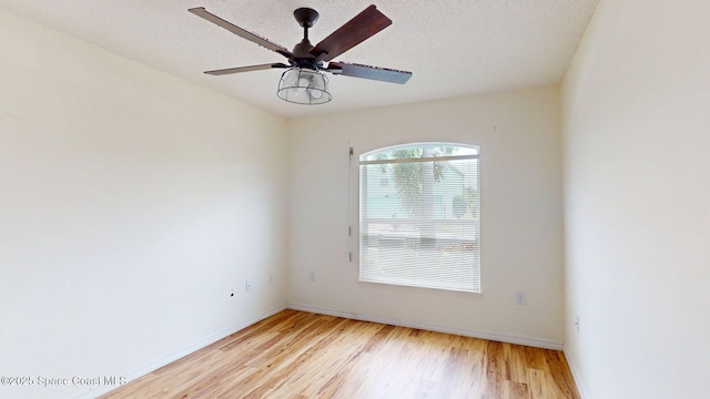 2178 Redwood Cir NE, Palm Bay, FL 32905 - unfurnished room with light wood-type flooring, baseboards, and a ceiling fan