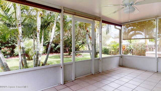 2178 Redwood Cir NE, Palm Bay, FL 32905 - unfurnished sunroom featuring a ceiling fan