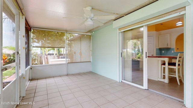 2178 Redwood Cir NE, Palm Bay, FL 32905 - unfurnished sunroom featuring a ceiling fan