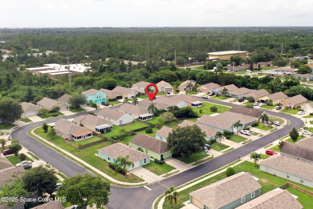 2178 Redwood Cir NE, Palm Bay, FL 32905 - aerial view of residential area featuring a heavily wooded area