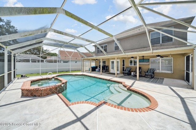 1236 Foxridge Pl, Melbourne, FL 32940 - view of pool with a ceiling fan, a patio, a pool with connected hot tub, and glass enclosure