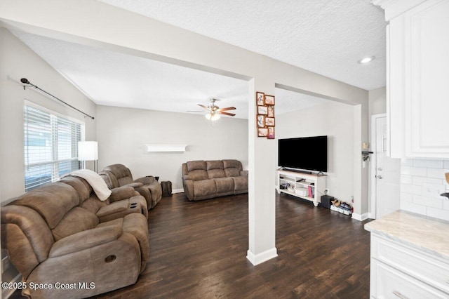 1236 Foxridge Pl, Melbourne, FL 32940 - living area with dark wood finished floors, ceiling fan, recessed lighting, and a textured ceiling