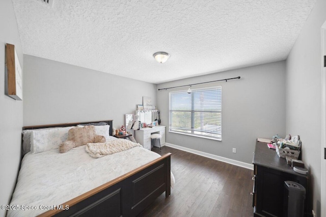 1236 Foxridge Pl, Melbourne, FL 32940 - bedroom featuring dark wood-style flooring and a textured ceiling
