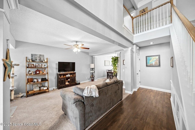 1236 Foxridge Pl, Melbourne, FL 32940 - living area featuring decorative columns, ceiling fan, and wood finished floors