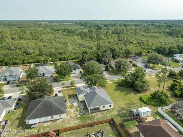 3977 Foothill Dr, Titusville, FL 32796 - aerial view of residential area with a heavily wooded area