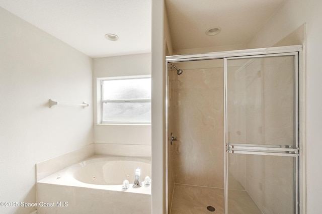 3977 Foothill Dr, Titusville, FL 32796 - full bath featuring a shower stall and a jetted tub