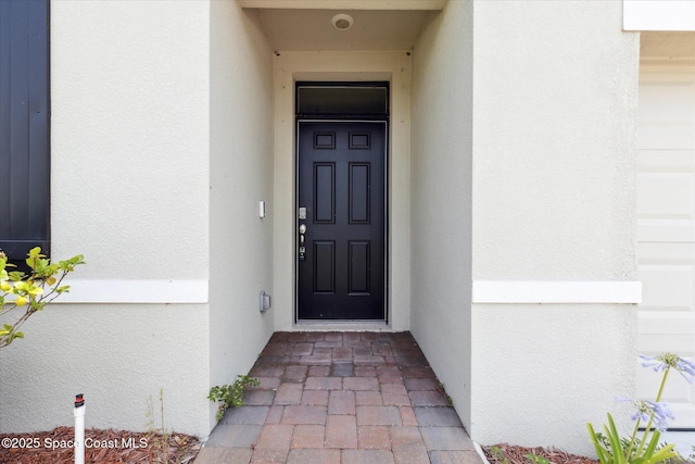 1103 Dunes Ave, Melbourne, FL 32904 - property entrance with stucco siding