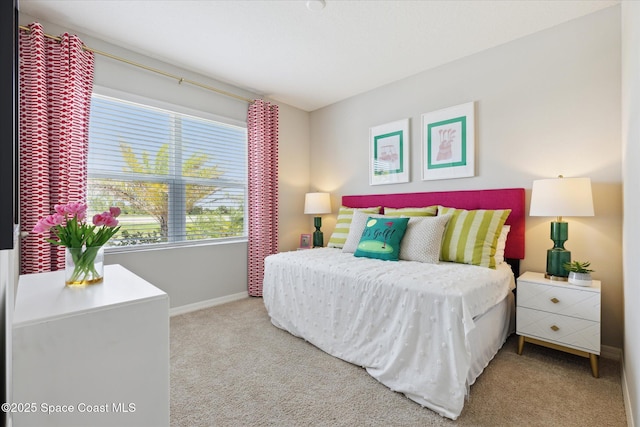 1103 Dunes Ave, Melbourne, FL 32904 - carpeted bedroom with baseboards