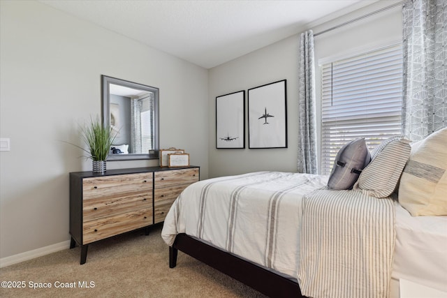 1103 Dunes Ave, Melbourne, FL 32904 - bedroom with carpet floors and baseboards