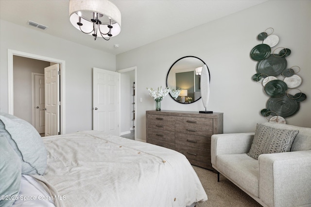 1103 Dunes Ave, Melbourne, FL 32904 - carpeted bedroom featuring a chandelier