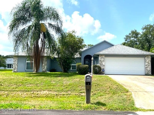 1796 Lambton St NW, Palm Bay, FL 32907 - ranch-style home featuring stone siding, a garage, concrete driveway, and a front yard