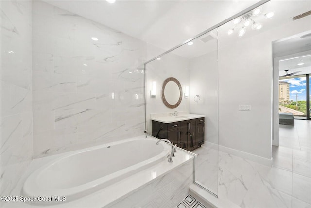 3031 Hafen Ln Unit 306, Melbourne Beach, FL 32951 - ensuite bathroom featuring a bath, vanity, and marble finish floors
