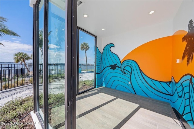 3031 Hafen Ln Unit 306, Melbourne Beach, FL 32951 - entryway featuring wood finished floors and recessed lighting