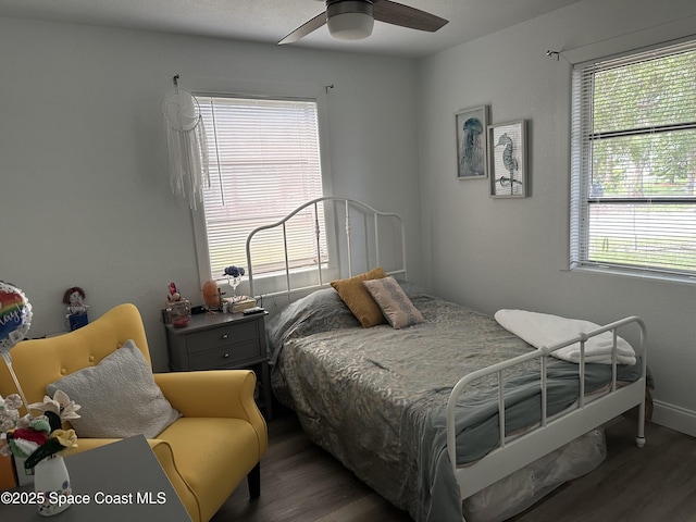 1602 Harvard Dr, Cocoa, FL 32922 - bedroom with wood finished floors, baseboards, and a ceiling fan