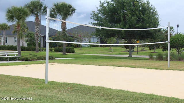 3485 Sansome Cir, Melbourne, FL 32940 - view of community with volleyball court and a yard
