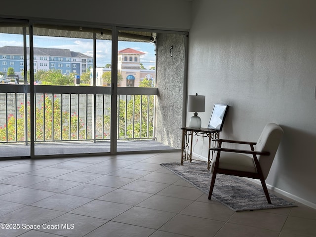 933 Sonesta Ave NE Unit 208, Palm Bay, FL 32905 - sunroom with plenty of natural light