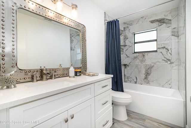 813 Laurel Dr, Rockledge, FL 32955 - bathroom featuring vanity, shower / bath combination with curtain, toilet, and wood finished floors