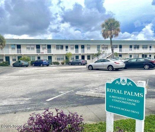 2170 Knox Mcrae Dr Unit 2, Titusville, FL 32780 - view of uncovered parking lot