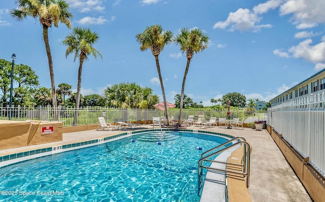 2170 Knox Mcrae Dr Unit 2, Titusville, FL 32780 - community pool with a patio area