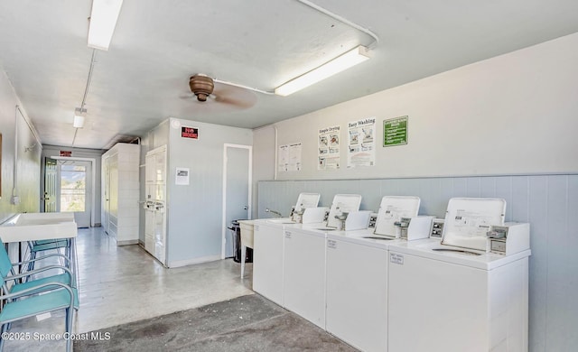 2170 Knox Mcrae Dr Unit 2, Titusville, FL 32780 - community laundry room with washing machine and dryer and ceiling fan