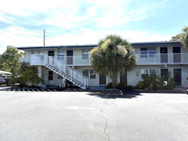 2170 Knox Mcrae Dr Unit 2, Titusville, FL 32780 - view of property featuring stairway