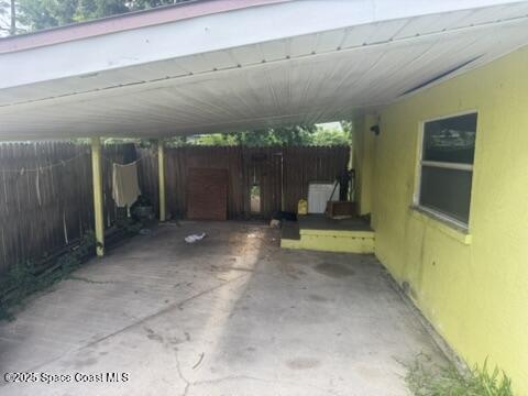 1236 Jackson St, Cocoa, FL 32922 - view of patio with an attached carport