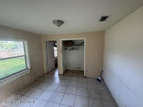 1236 Jackson St, Cocoa, FL 32922 - unfurnished bedroom with light tile patterned floors
