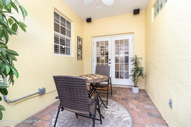 142 Ocean Garden Ln, Cape Canaveral, FL 32920 - view of patio featuring ceiling fan and french doors