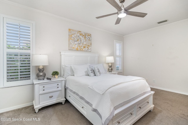 142 Ocean Garden Ln, Cape Canaveral, FL 32920 - bedroom featuring light colored carpet, multiple windows, ornamental molding, and ceiling fan