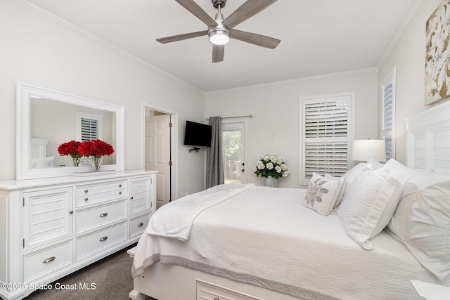 142 Ocean Garden Ln, Cape Canaveral, FL 32920 - bedroom with ornamental molding, access to outside, dark carpet, and ceiling fan