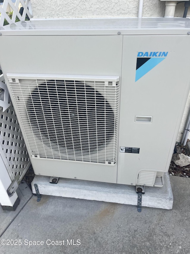 142 Ocean Garden Ln, Cape Canaveral, FL 32920 - exterior view of a cooling unit