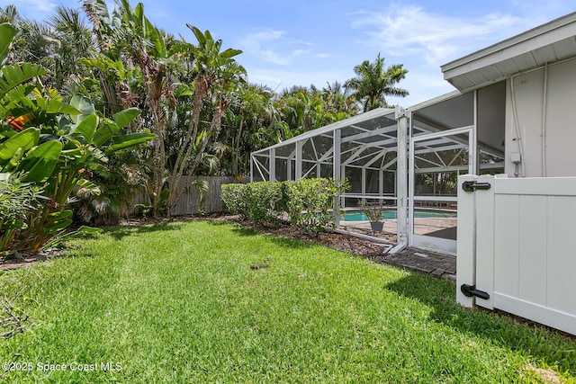 320 Cocoa Ave, Indialantic, FL 32903 - fenced backyard featuring glass enclosure