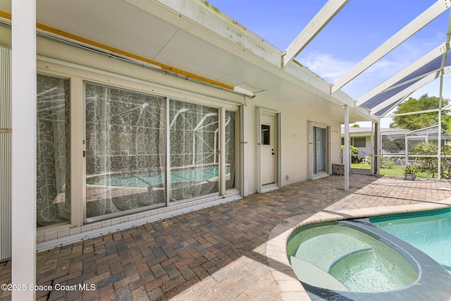 320 Cocoa Ave, Indialantic, FL 32903 - view of pool featuring a patio area, a lanai, and a pool with connected hot tub